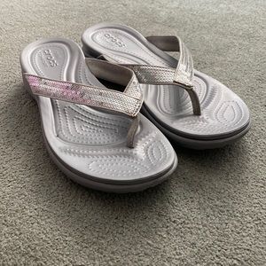 Silver croc flip-flops